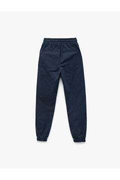 Koton Erkek Çocuk Beli Bağcıklı Cep Detaylı Pamuklu Gabardin Jogger Pantolon