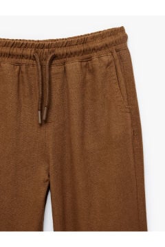 Koton Erkek Bebek Keten ve Viskon Karışımlı Beli Bağlamalı Rahat Kesim Basic Pantolon